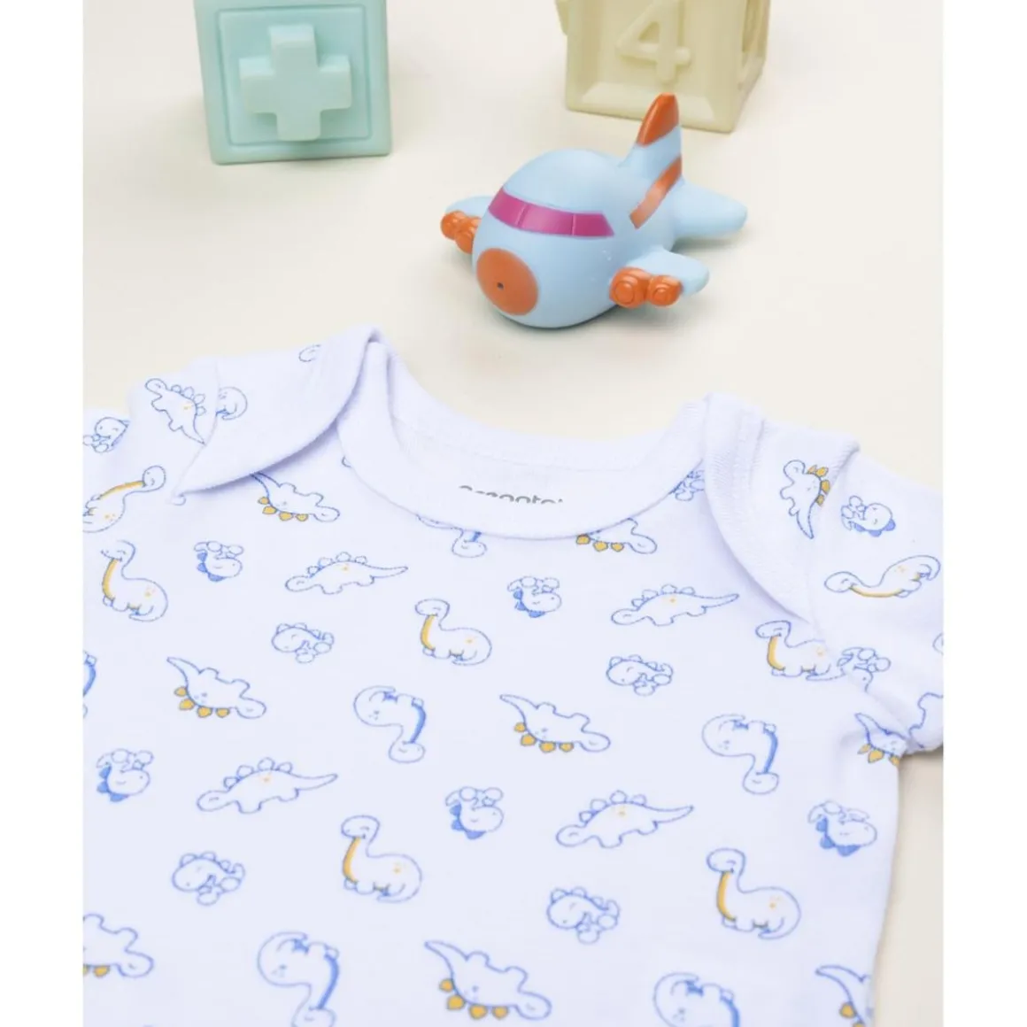 Body bebé manga corta con estampado de dinosaurios