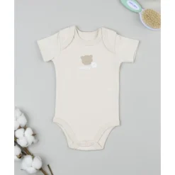 Body de bebé en algodón beige con osito