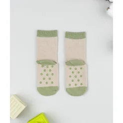 Calcetines antideslizantes niño beige león
