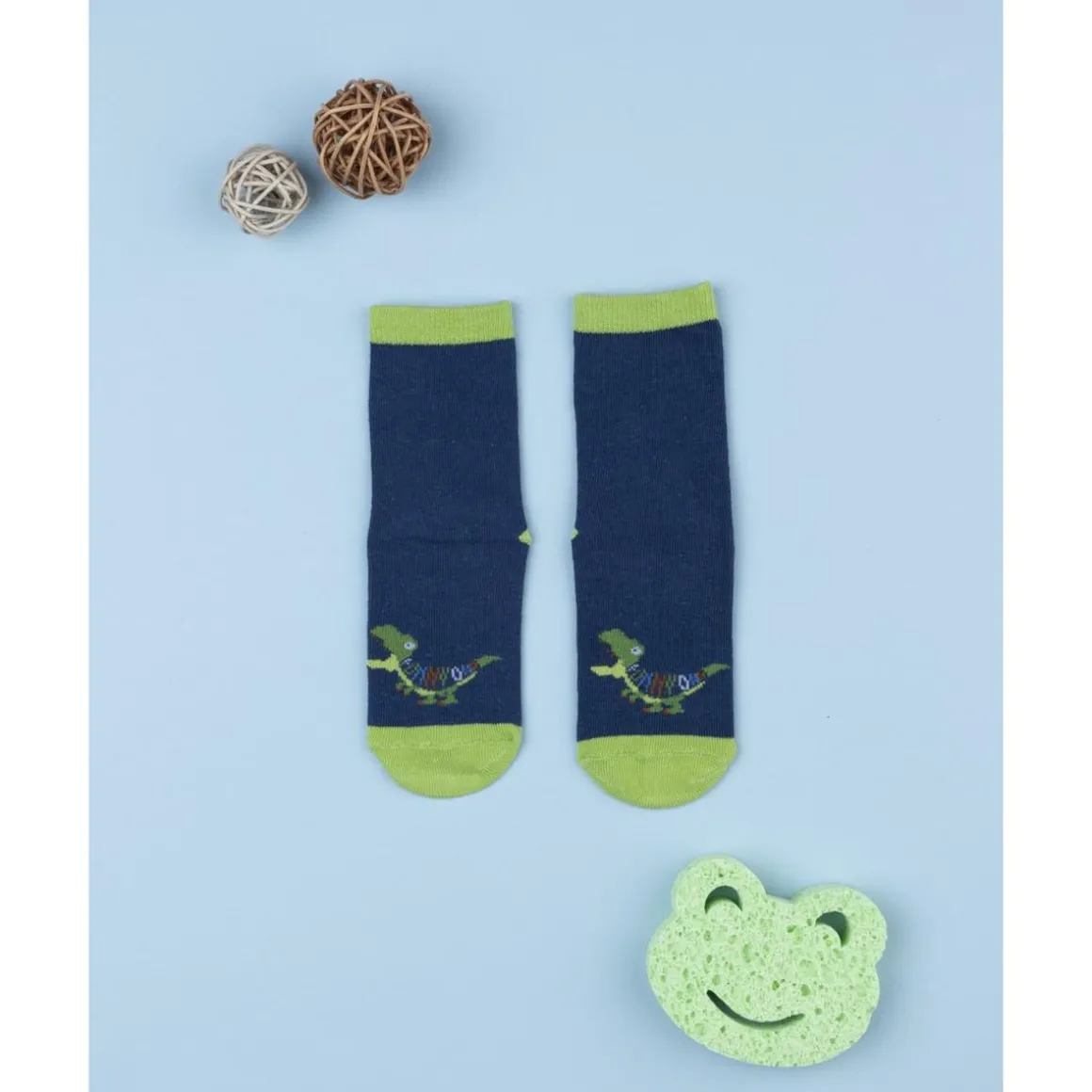 Calcetines antideslizantes azul con dinosaurio