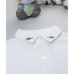 Camisa blanca con bordado perritos niño