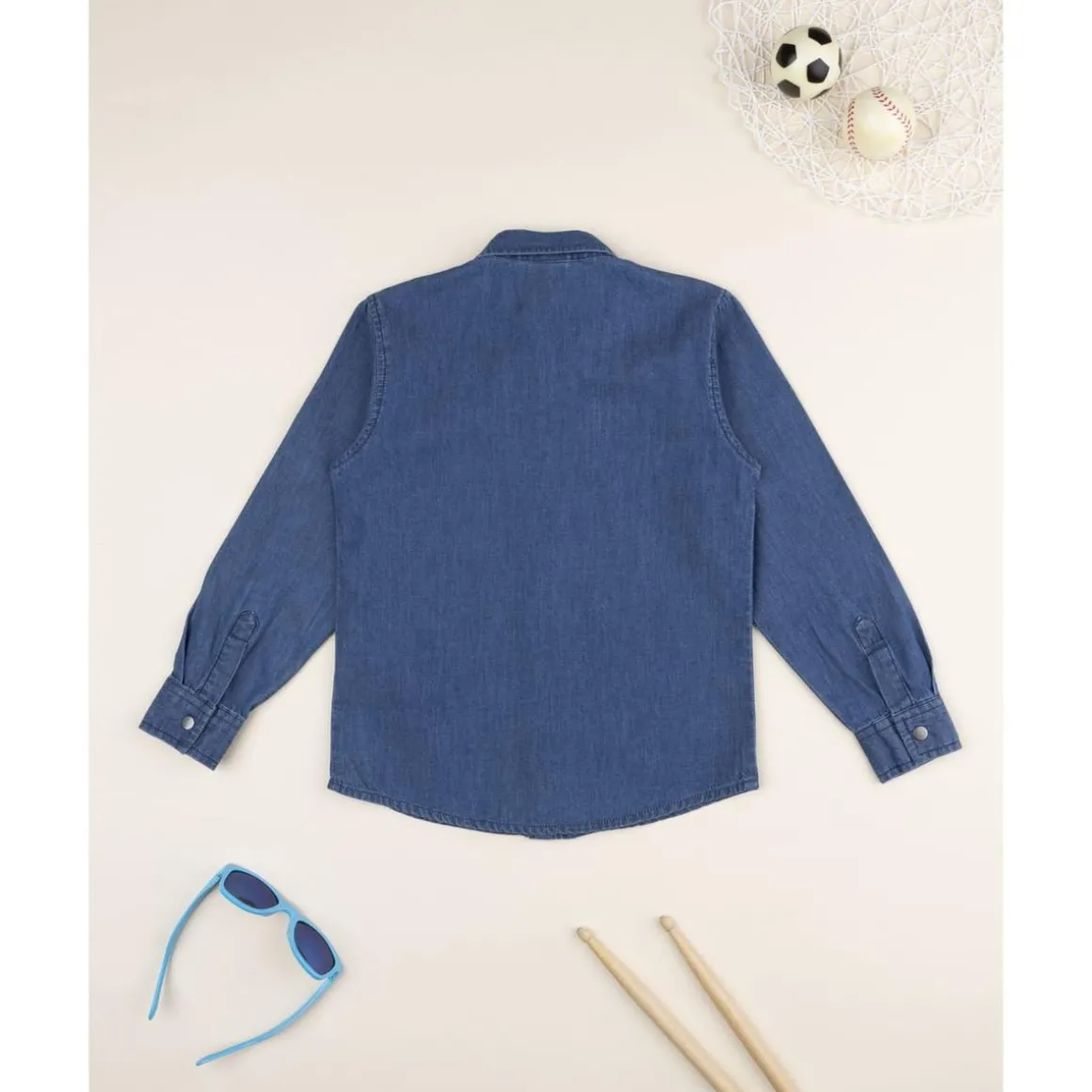 Camisa niño en denim azul con bolsillos