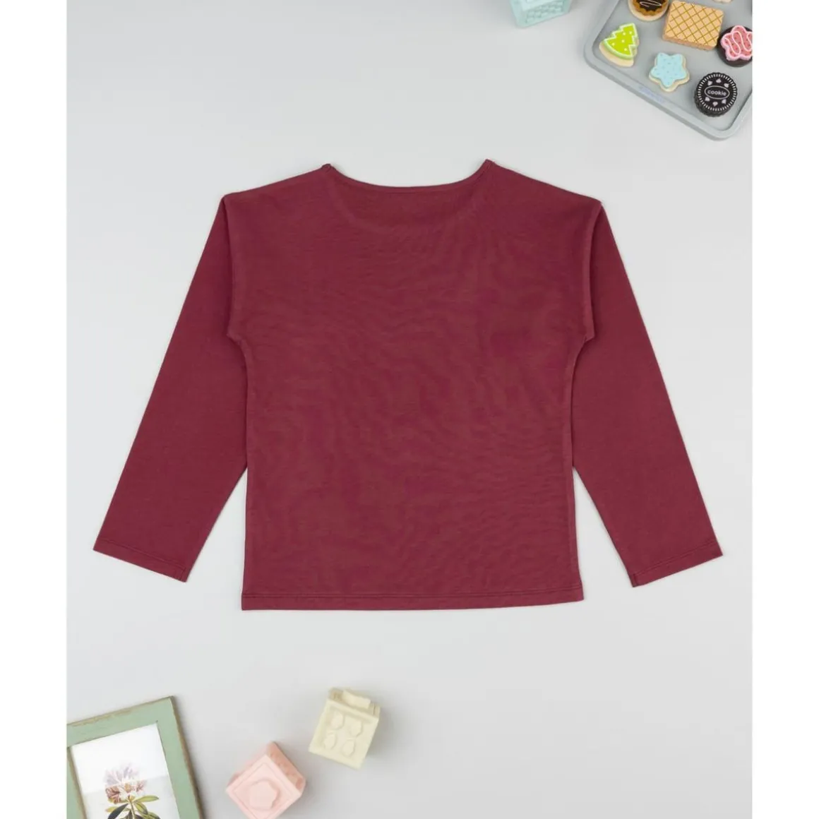 Camiseta burdeos de niña con osito