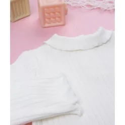 Camiseta cuello alto canalé blanca niña