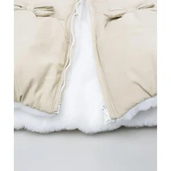 Chaqueta beige con lazos para niña