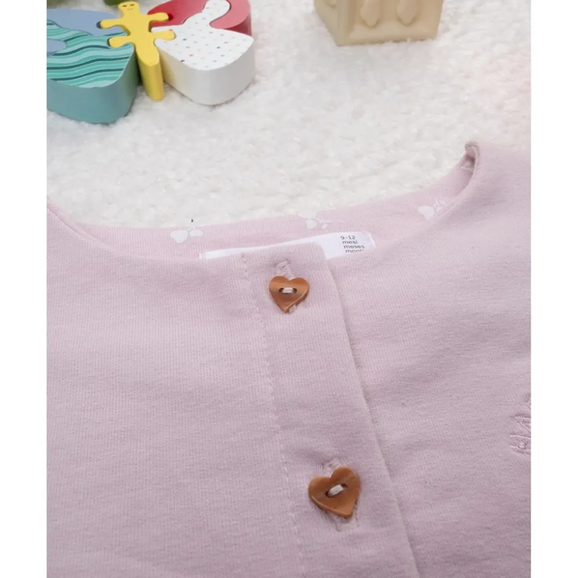 Chaqueta niña rosa con bordado de corazón