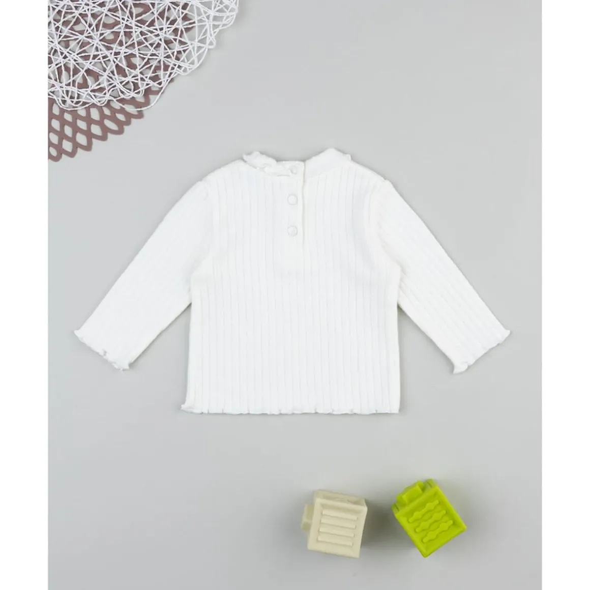 Jersey de niña en canalé blanco