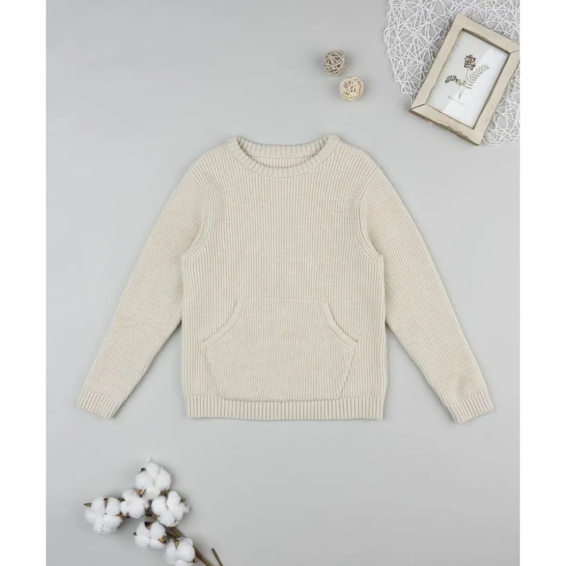 Jersey de niño beige con bolsillo