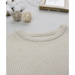 Jersey de niño beige con bolsillo