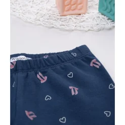Leggings azules con lazos y corazones para niña