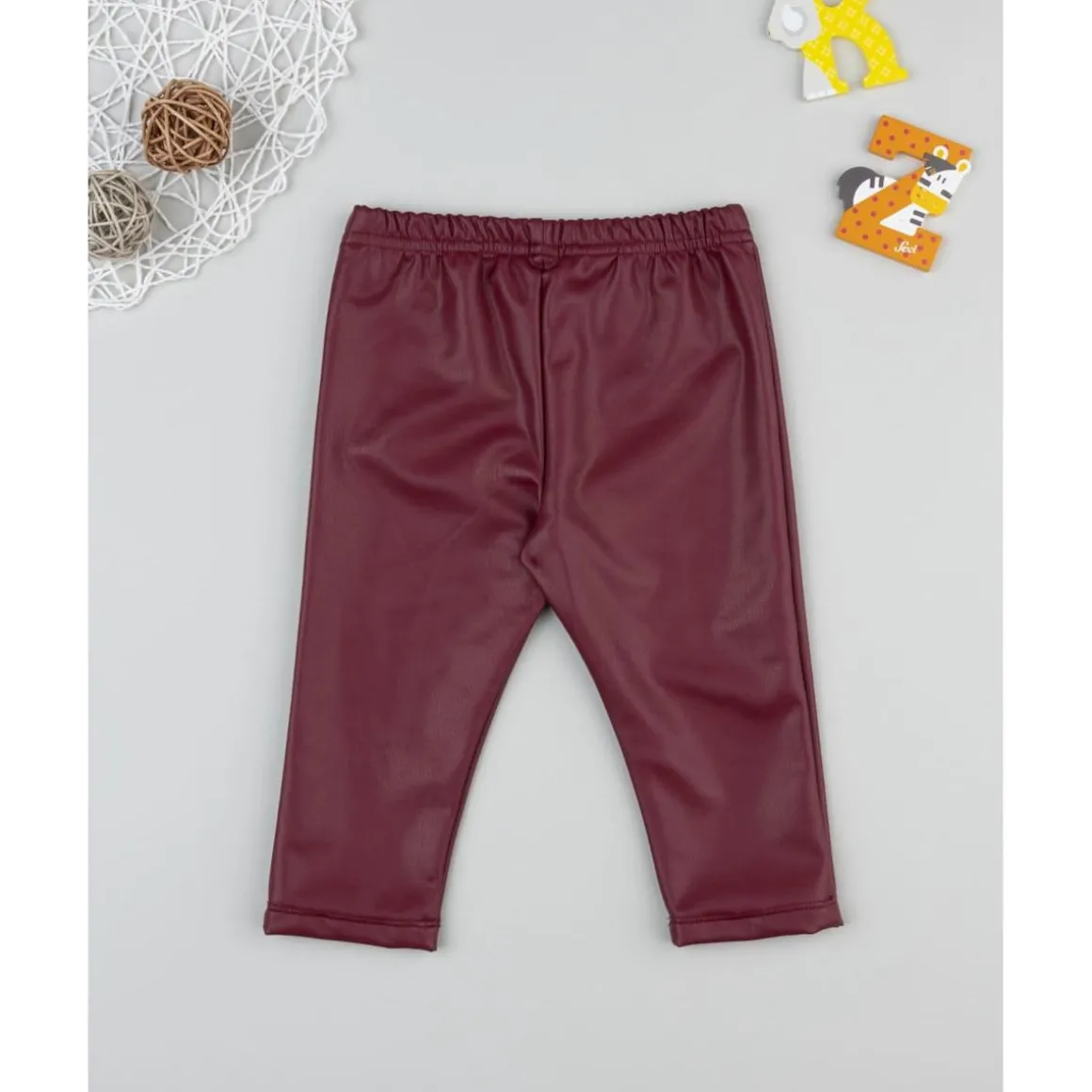 Leggings efecto piel burdeos para niña