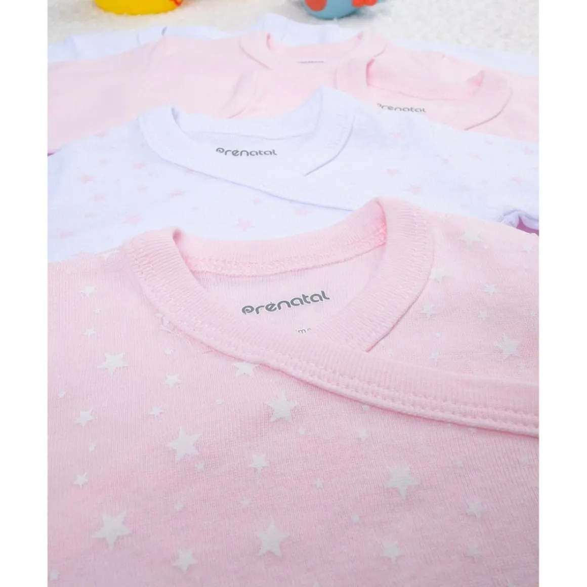 Pack de 5 bodies rosas, blancos y con estrellitas