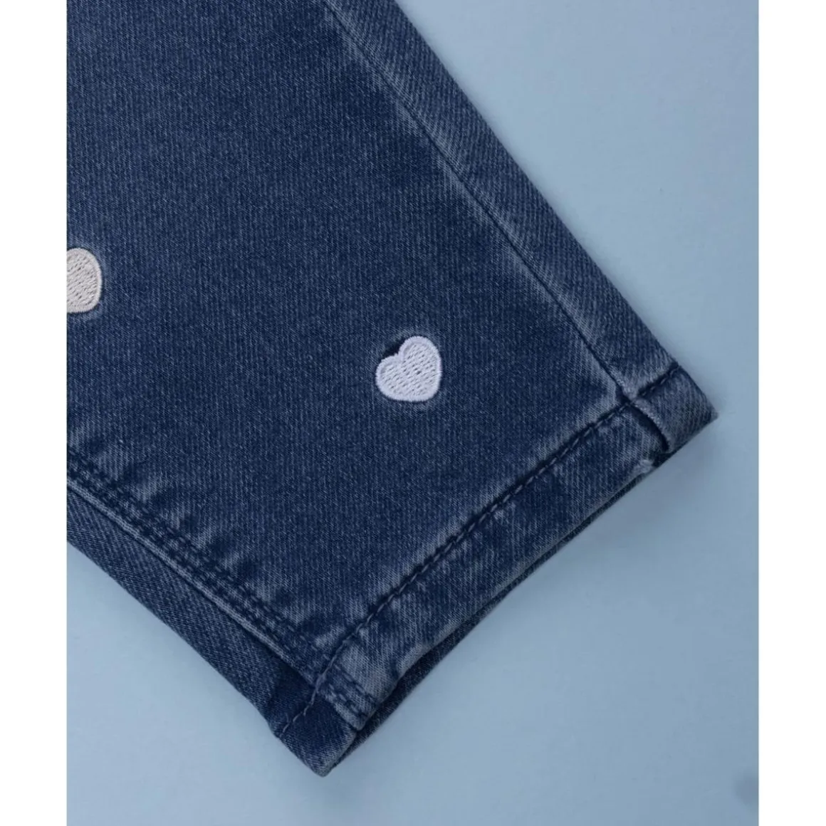 Pantalón denim niña corazones