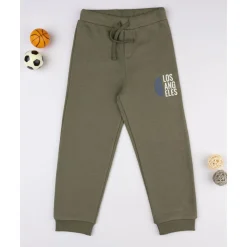 Pantalón verde con estampado para niño