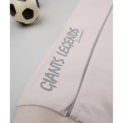 Pantalones niño beige dinosaurios