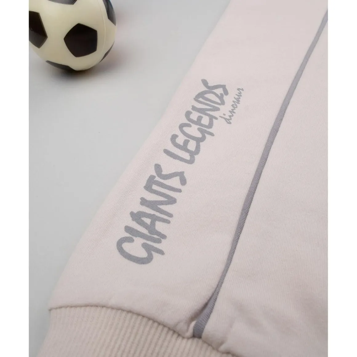 Pantalones niño beige dinosaurios