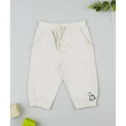 Pantalones niño beige estampado relieve