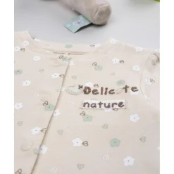 Pelele beige flores