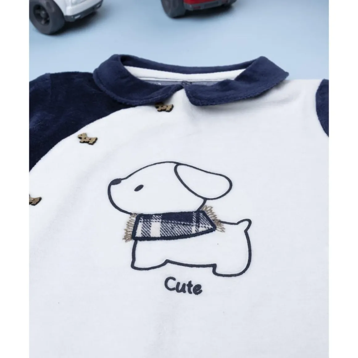 Pelele blanco y azul de niña con perrito