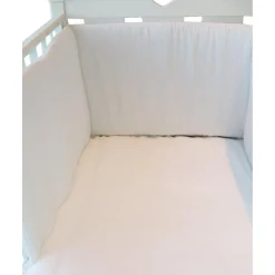 Protector de cuna de algodón blanco