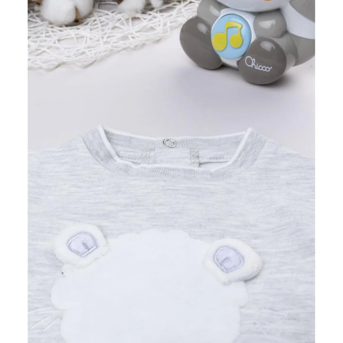 Tutina bebé gris con estampado